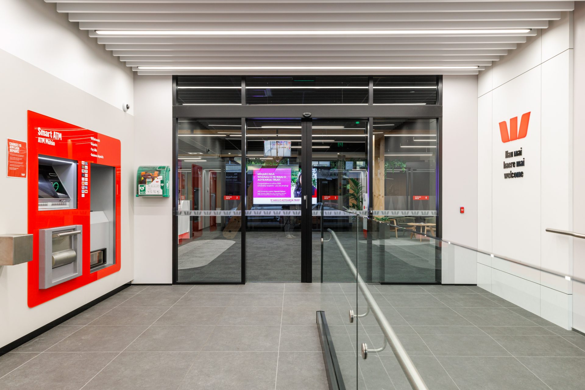 Entrance with Smart ATM and welcome wall